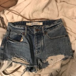 Slightly destroyed denim shorts